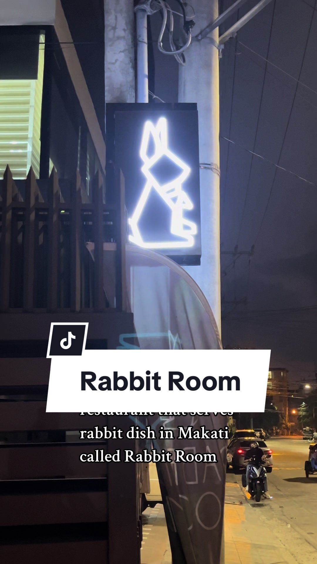 Rabbit Room neon rabbit sign glowing at night on Sampaloc Street